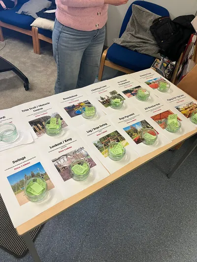 Parents placing tokens in jars